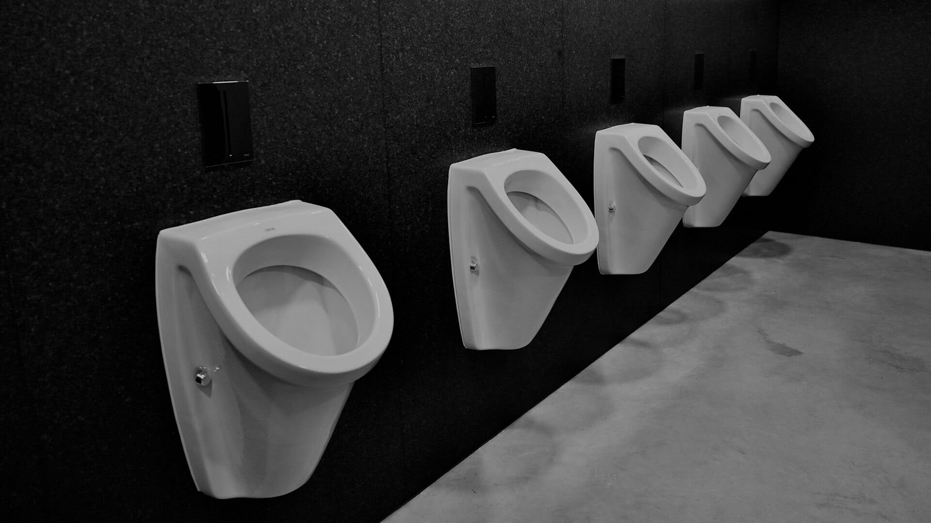 ada public urinal installation